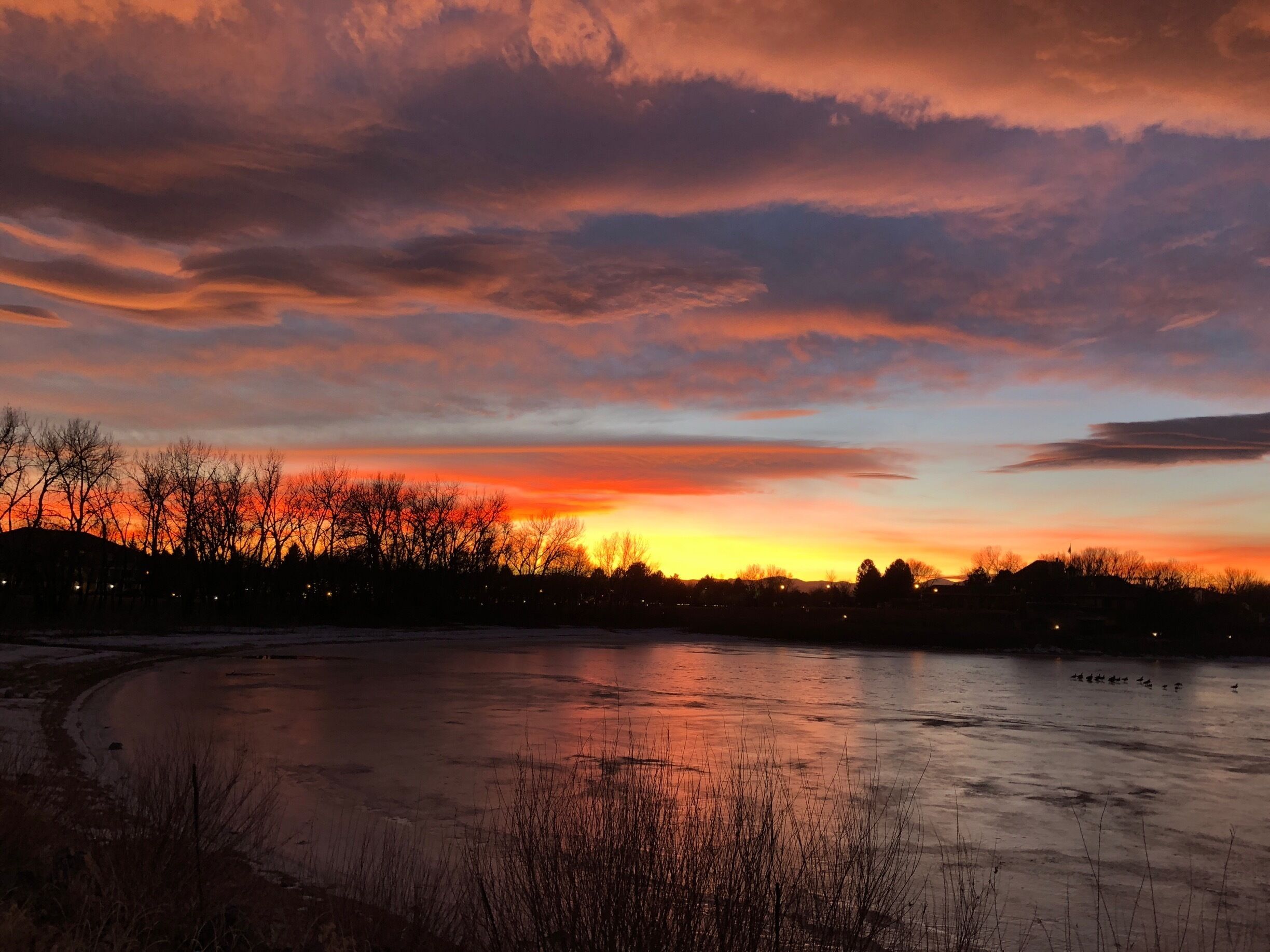 If you’re lucky enough to have friends in the gated complex you can be treated to these sunsets by the lake