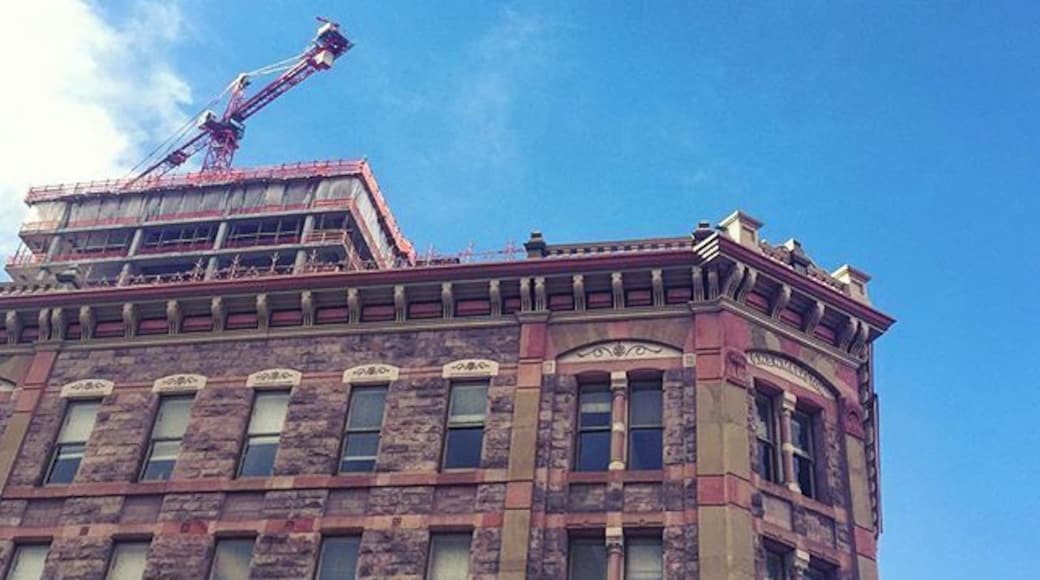 #downtown #denver #colorado ...a #crane pulling up a new #building behind #historic #larimersquare #historicpreservation #milehighcity ... The #city is growing so fast! #architecture