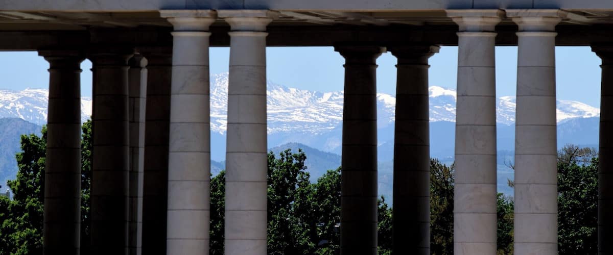 In springtime, the Rockies are still covered in snow while it's in the 70s and 80s in the city. Some of the best views in town are at Cheesman Park.