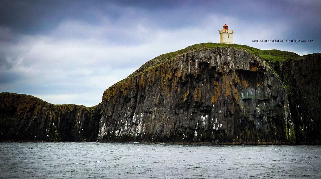 The weather was grey and dreary through the waterways of Iceland on the day that we ferried across. However, I was able to spot this lighthouse on a passing-by island!
https://society6.com/heatherdoughtyphotography