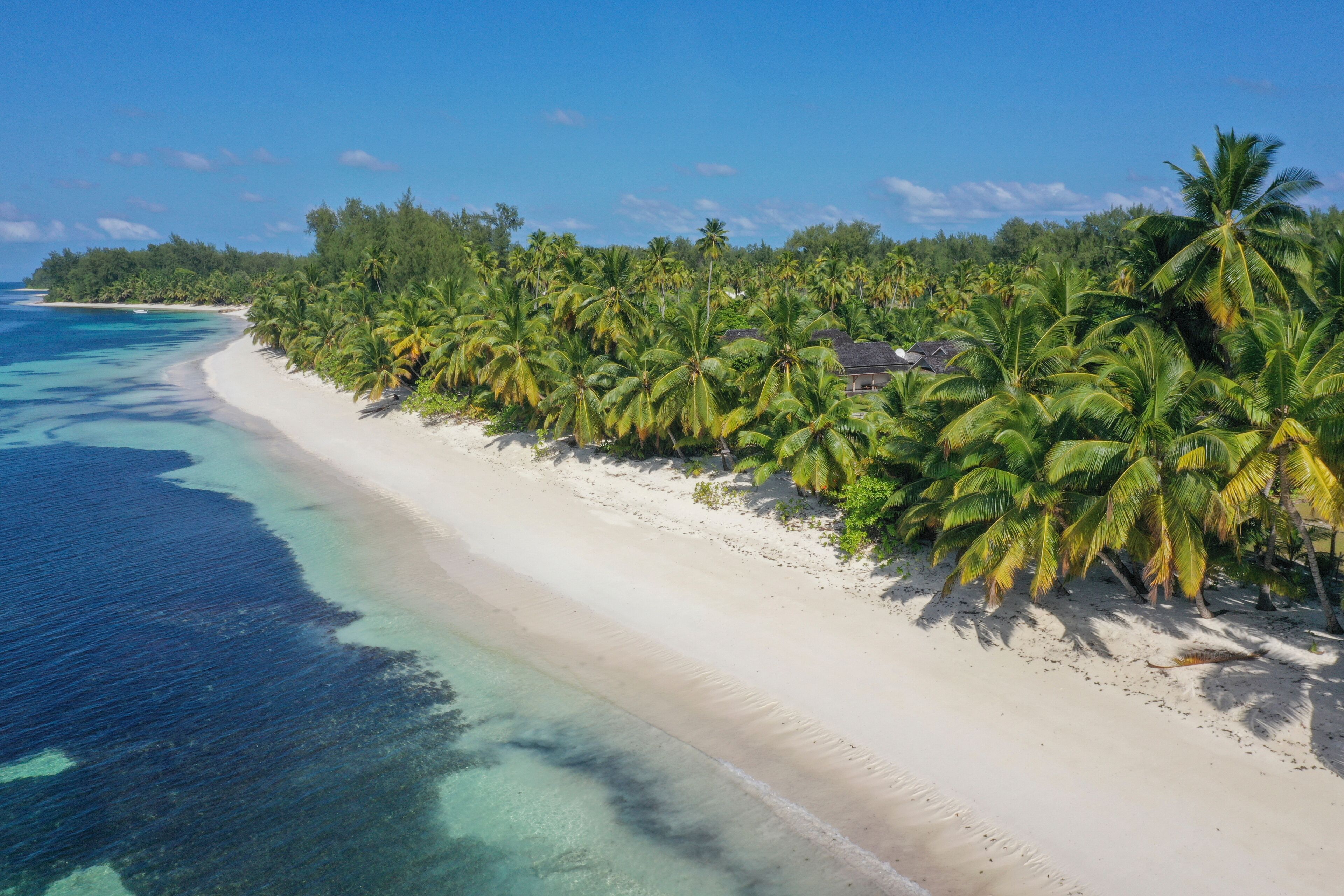 Aerial view of the beach at Desroche Island, Seychelles.