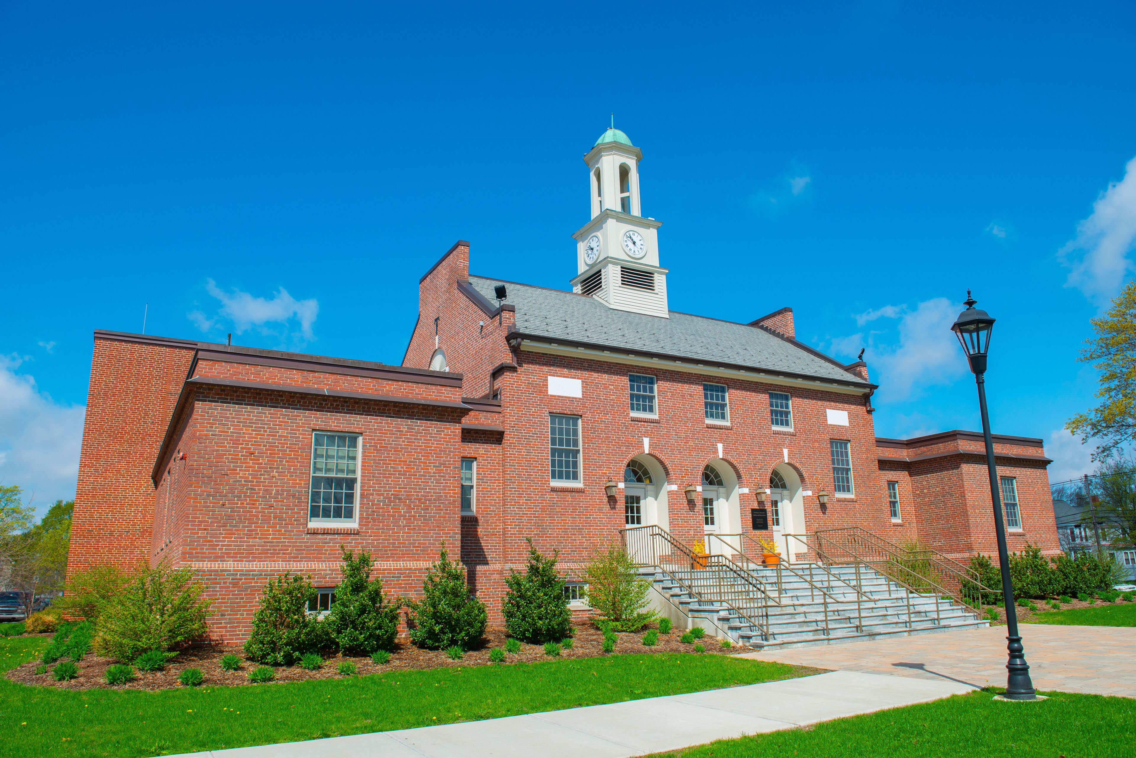 Tewksbury Town Hall in spring at 1009 Main Street on Town Common in historic town center of Tewksbury, Middlesex County, Massachusetts MA, USA. 
