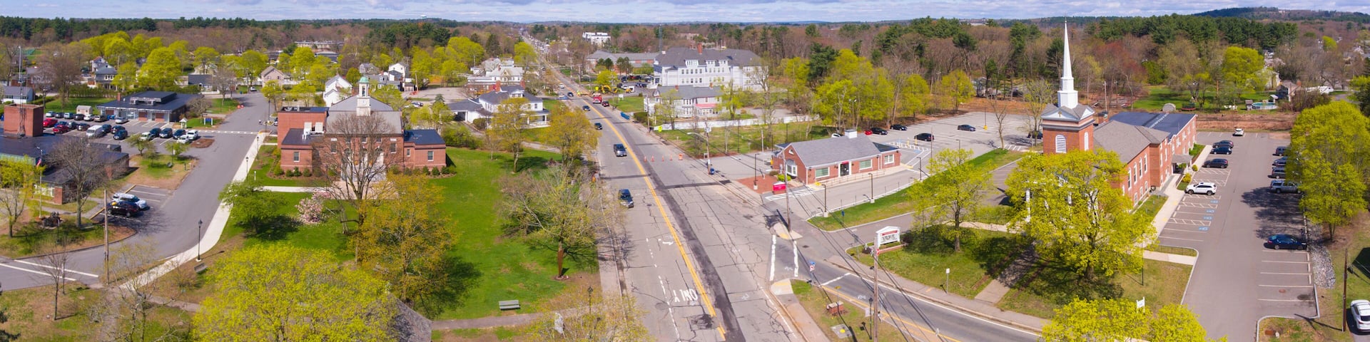 Tewksbury Town Hall and Congregational Church aerial view in spring on Town Common in historic town center of Tewksbury, Middlesex County, Massachusetts MA, USA.