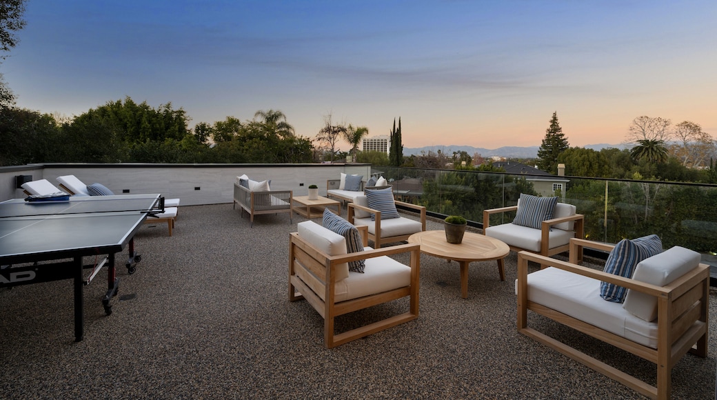 Table tennis set on rooftop near balcony, New Construction Home in Tarzana, California