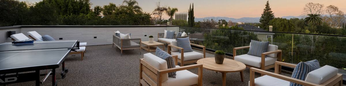 Table tennis set on rooftop near balcony, New Construction Home in Tarzana, California
