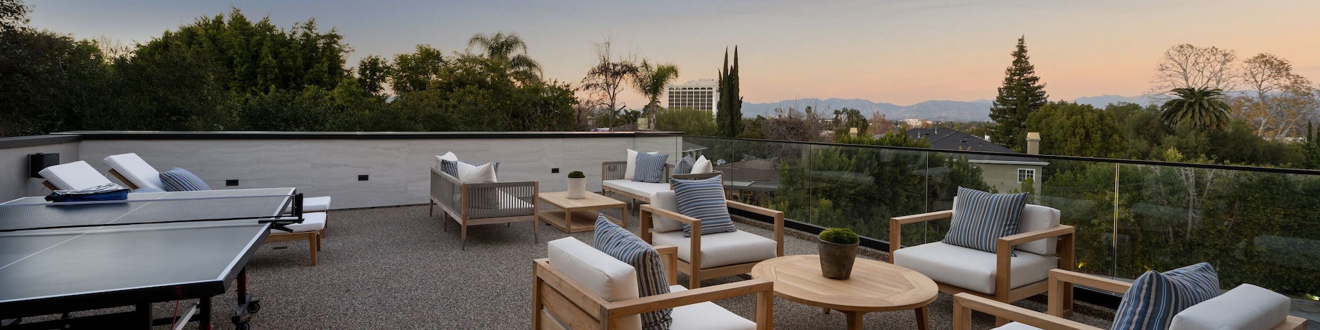 Table tennis set on rooftop near balcony, New Construction Home in Tarzana, California