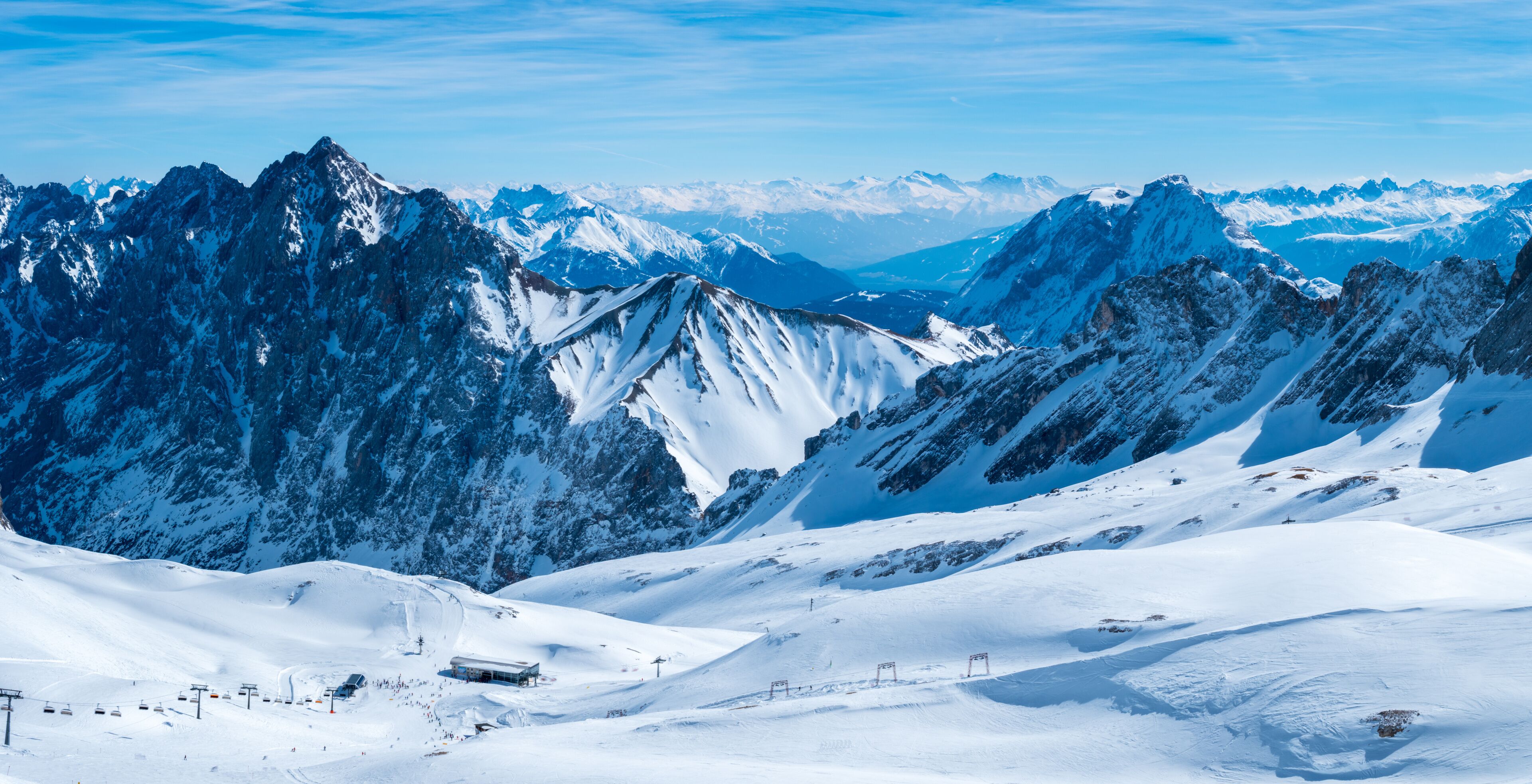 View from the German Zugspitze across the top of a snow mountain landscape
