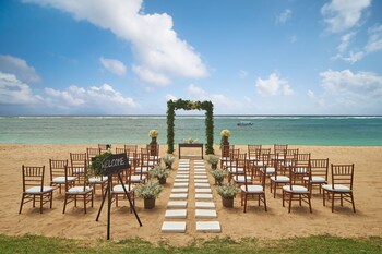 Beach nearby, white sand, beach umbrellas, beach towels