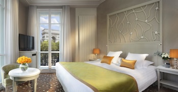 Ropa de cama de alta calidad, minibar, caja fuerte y cortinas opacas