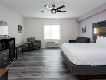 Premium bedding, blackout drapes, iron/ironing board