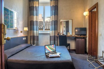 Hypoallergeen beddengoed, een minibar, een kluis op de kamer, een bureau