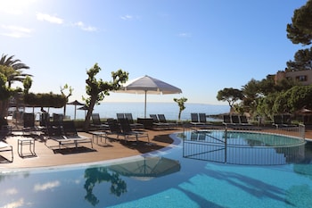 Indoor pool, outdoor pool, pool umbrellas, sun loungers