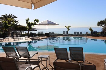 Indoor pool, outdoor pool, pool umbrellas, sun loungers