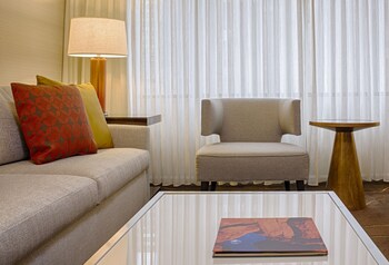 Flat-screen TV, iPod dock, pay movies