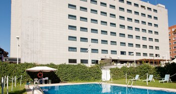 Seasonal outdoor pool, pool umbrellas, pool loungers