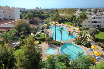 Indoor pool, 2 outdoor pools, open 9:00 AM to 7:00 PM, pool umbrellas