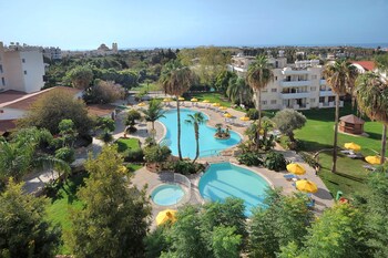 Indoor pool, 2 outdoor pools, open 9:00 AM to 7:00 PM, pool umbrellas