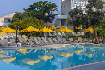 Indoor pool, 2 outdoor pools, open 9:00 AM to 7:00 PM, pool umbrellas