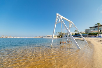 Private beach, sun-loungers, beach umbrellas, beach bar