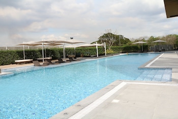 Outdoor pool, open 7:00 AM to 9:00 PM, sun loungers