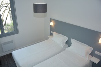 Ropa de cama de alta calidad, escritorio, wifi gratis