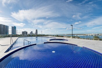Indoor pool, outdoor pool, pool umbrellas, pool loungers