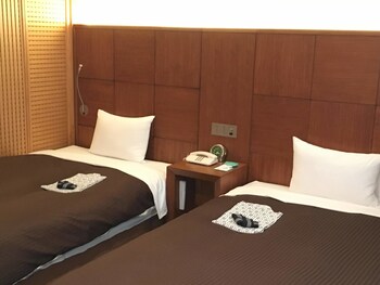 Desk, blackout drapes, free WiFi, linens