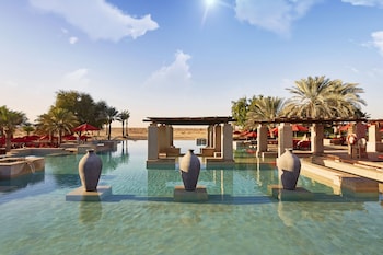2 outdoor pools, open 8:00 AM to 7:00 PM, pool umbrellas, pool loungers