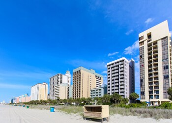 On the beach, white sand, beach towels