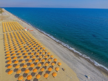 Private beach, sun-loungers, beach umbrellas, snorkelling