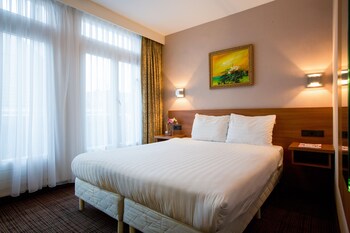 Select Comfort-bedden, een kluis op de kamer, een bureau