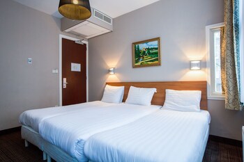 Select Comfort-bedden, een kluis op de kamer, een bureau