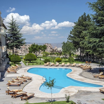 Indoor pool, outdoor pool, pool umbrellas, sun loungers