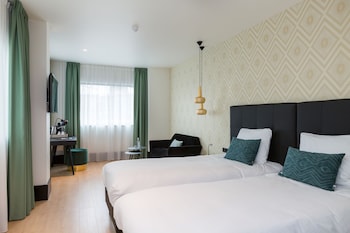 Een kluis op de kamer, verduisterende gordijnen, gratis wifi