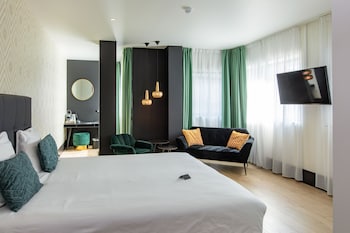 Een kluis op de kamer, verduisterende gordijnen, gratis wifi
