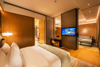 Free minibar, in-room safe, desk, iron/ironing board
