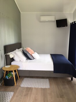 Premium bedding, pillow top beds, blackout curtains, soundproofing
