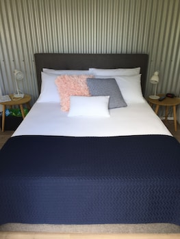 Premium bedding, pillow top beds, blackout curtains, soundproofing