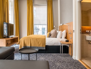 Premium bedding, pillow top beds, in-room safe, desk