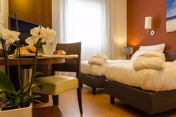 Copriletto in piuma, materassi a doppio strato, minibar