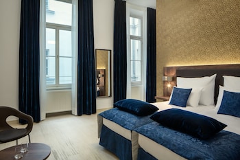 Premium bedding, memory foam beds, minibar, in-room safe