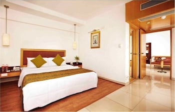 Roupas de cama premium, frigobar, cofres nos quartos, escrivaninha