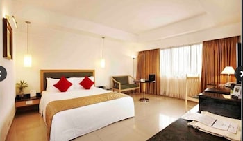 Roupas de cama premium, frigobar, cofres nos quartos, escrivaninha