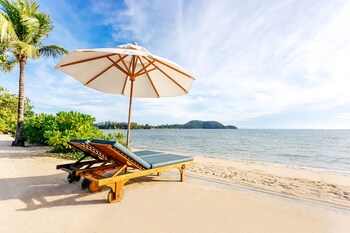 On the beach, free beach cabanas, sun-loungers, beach umbrellas