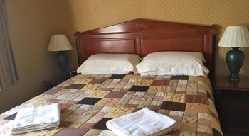 Desk, blackout drapes, iron/ironing board, free WiFi