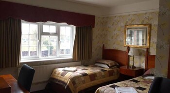 Desk, blackout drapes, iron/ironing board, free WiFi