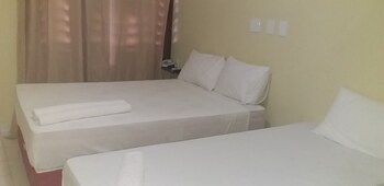 Frigobar, cortinas blackout, Wi-Fi de cortesia, roupa de cama