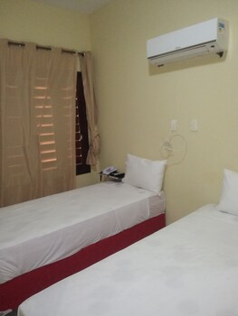 Frigobar, cortinas blackout, Wi-Fi de cortesia, roupa de cama