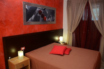 Minibar, tende oscuranti, culle/letti per bambini (gratuiti)