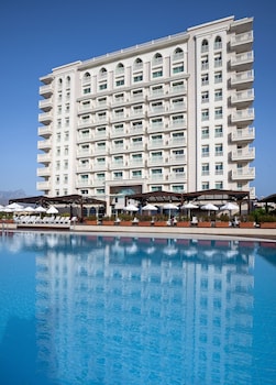Indoor pool, outdoor pool, pool umbrellas, sun loungers